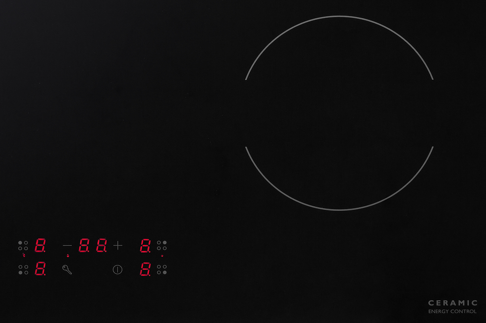 Piano cottura in vetroceramica DeLonghi, comandi frontale.